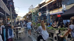 Riding through one of Tel Aviv's food markets