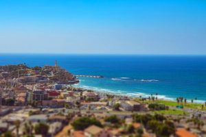 92425330 - aerial view of south tel aviv neighborhoods and old jaffa. recognized places such as the etzel museum, old jaffa port, tel aviv promenade and neve tzedek neighborhood. tilt shift.